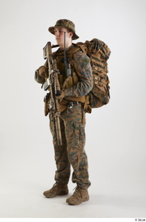 Photos Casey Schneider Paratrooper with gun holding gun standing whole…